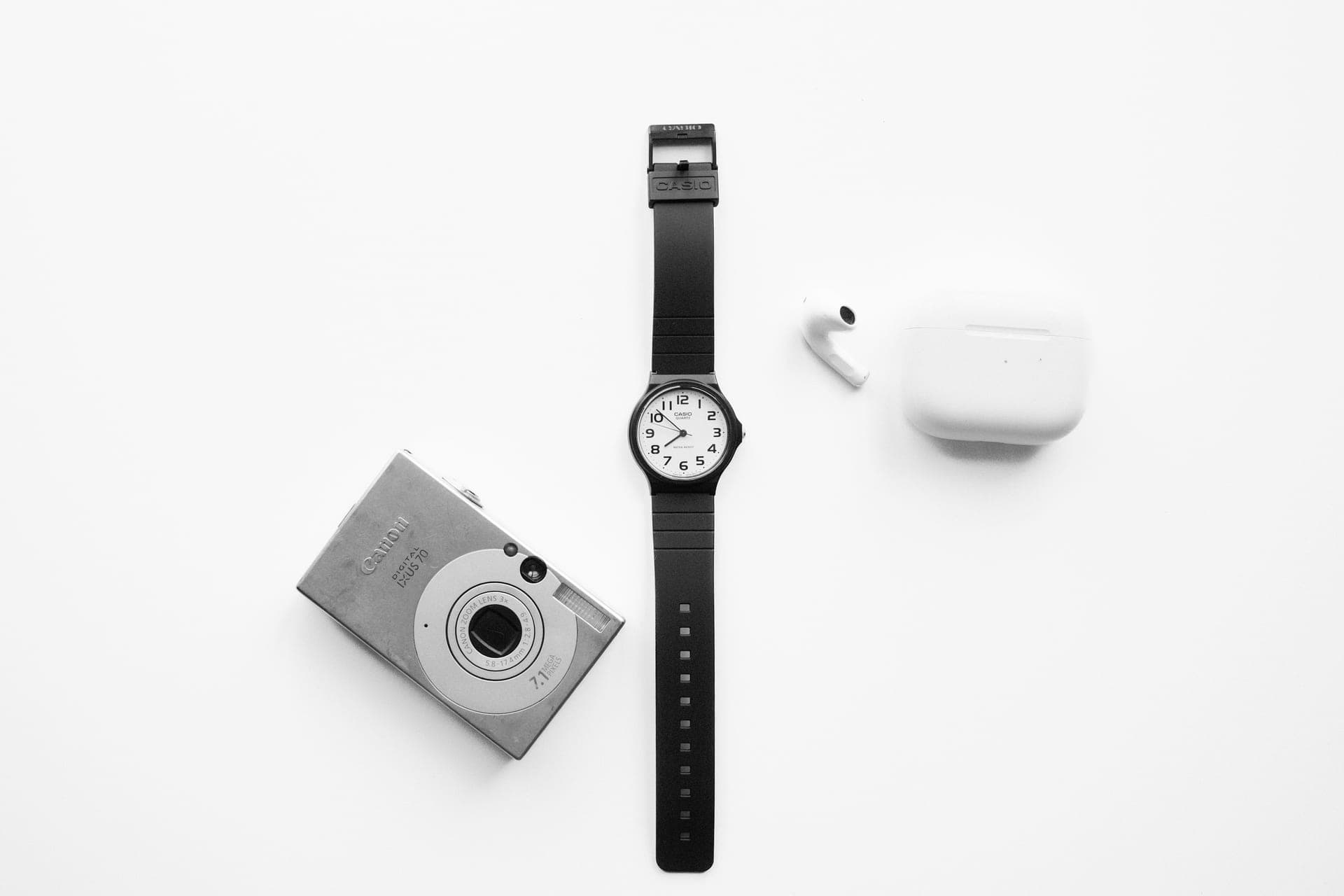 Two sports watches photographed side by side on a white surface